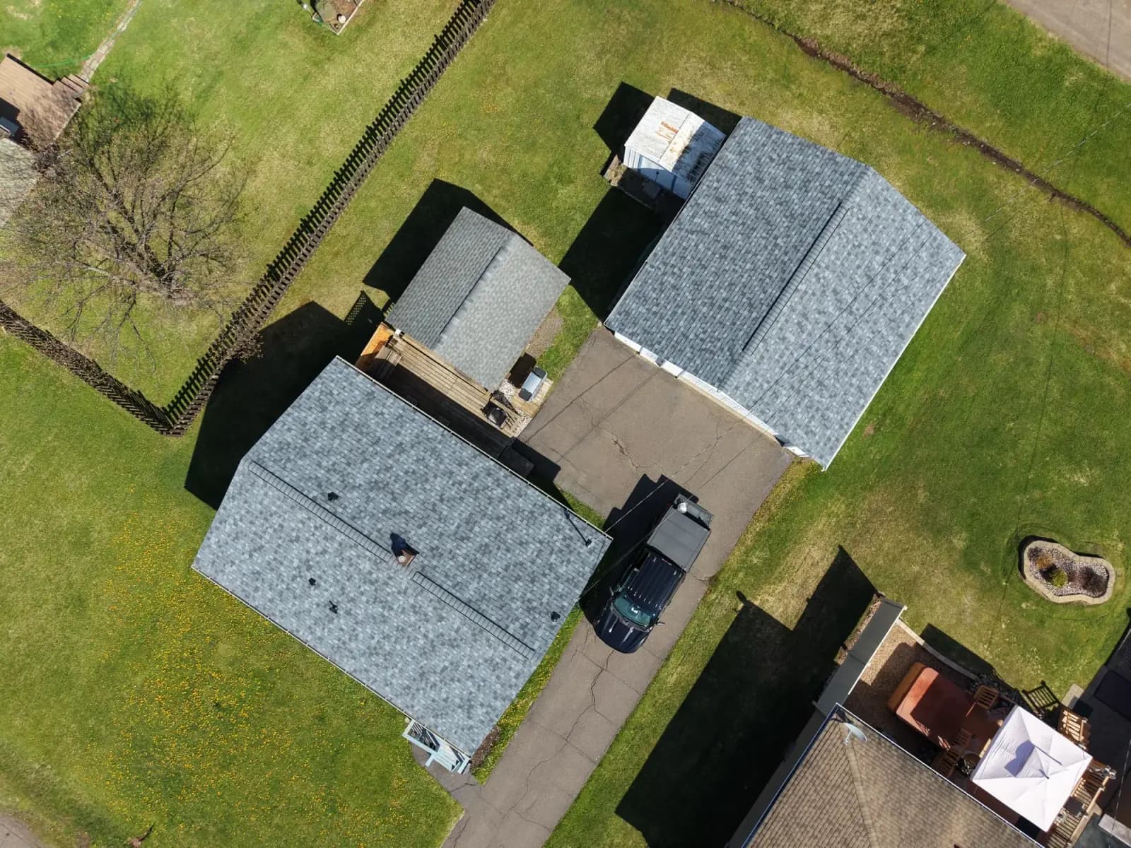New roof on a home and its detached garage, matched